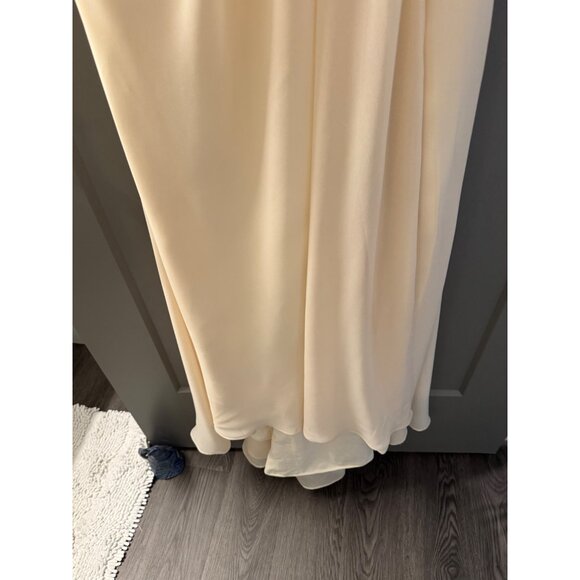 Elegant Floor-Length Cream Gown With Pleated V-Neckline & Flowing Hemline Sleeve - Picture 4 of 5